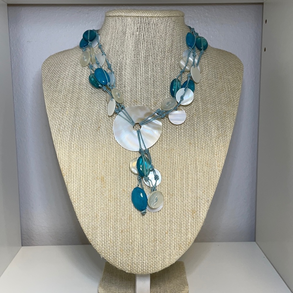 Beautiful boho chic aqua blue and pearl white necklace.